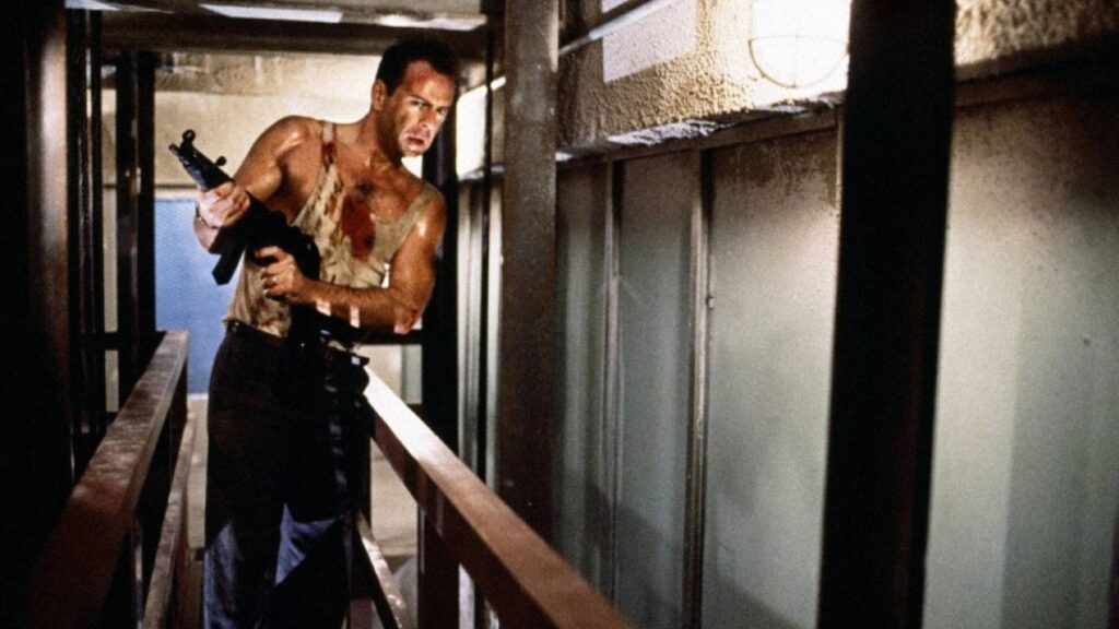Trappola di cristallo, perché Bruce Willis indossa dei piedi di gomma, in alcune scene Bruce Willis in unna scena di Die Hard