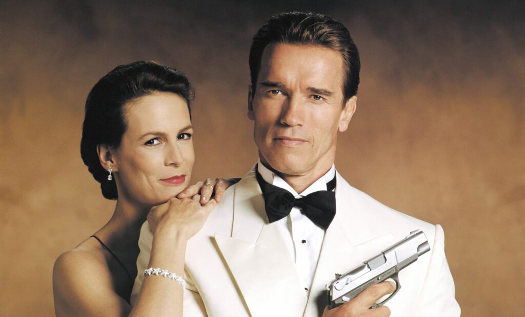 jamie Lee Curtis e Arnold Schwarzenegger in True Lies.