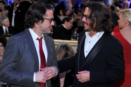 Depp e Downey Jr. ai Globes 2011 [Getty]