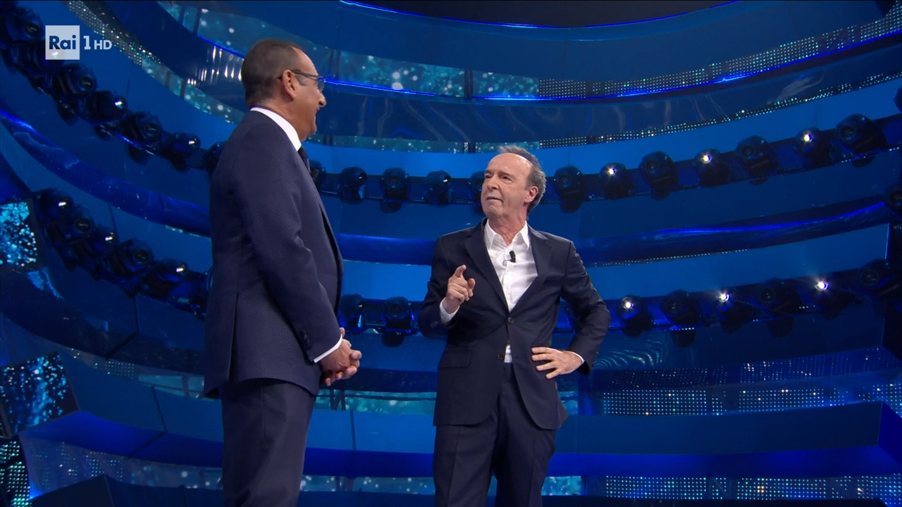 Roberto Benigni e Carlo Conti a Sanremo 2025