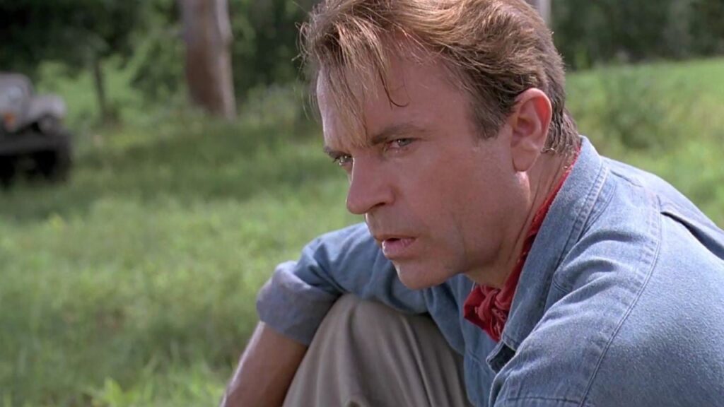 Sam Neill in una scena di Jurassic Park.
