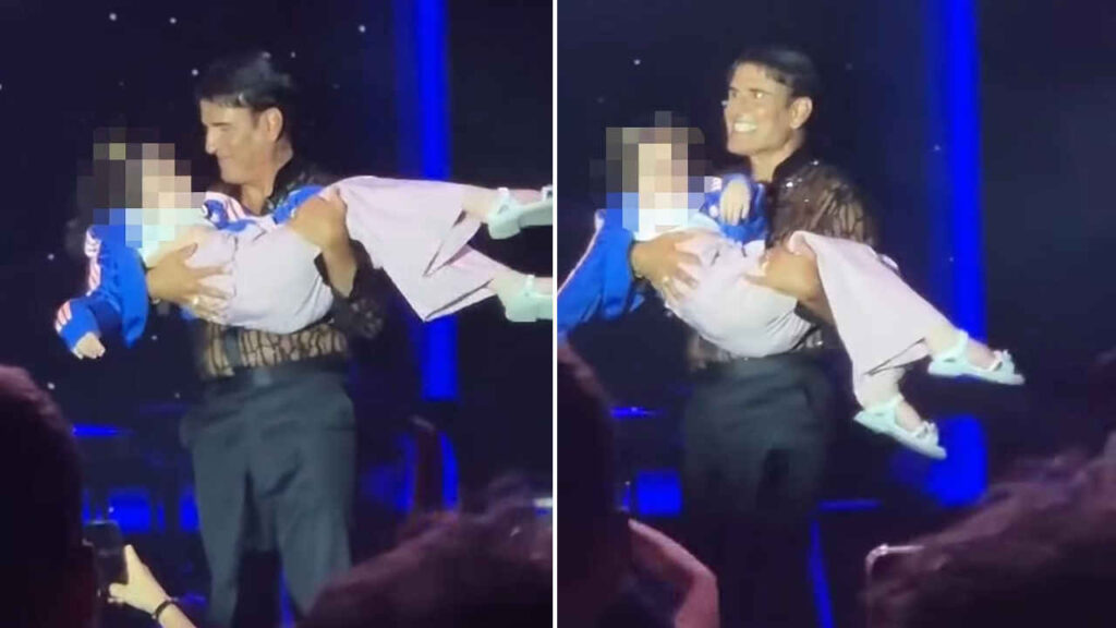 Sal Da Vinci con una bambina disabile durante un concerto ad Agrigento